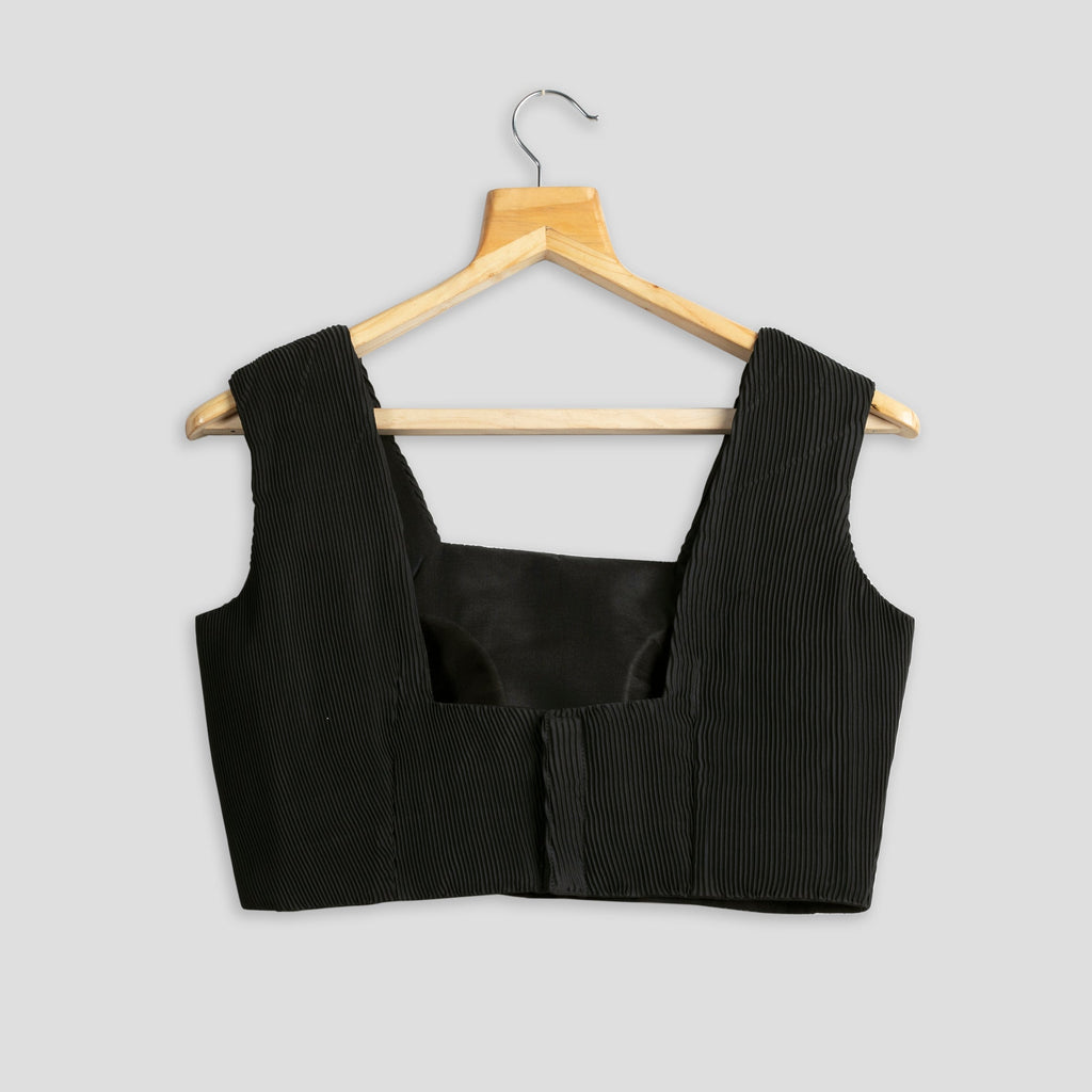 Blusa plisada negra