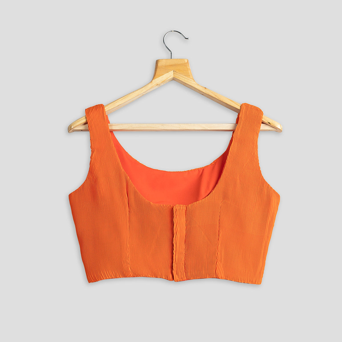 Blusa plisada naranja albaricoque
