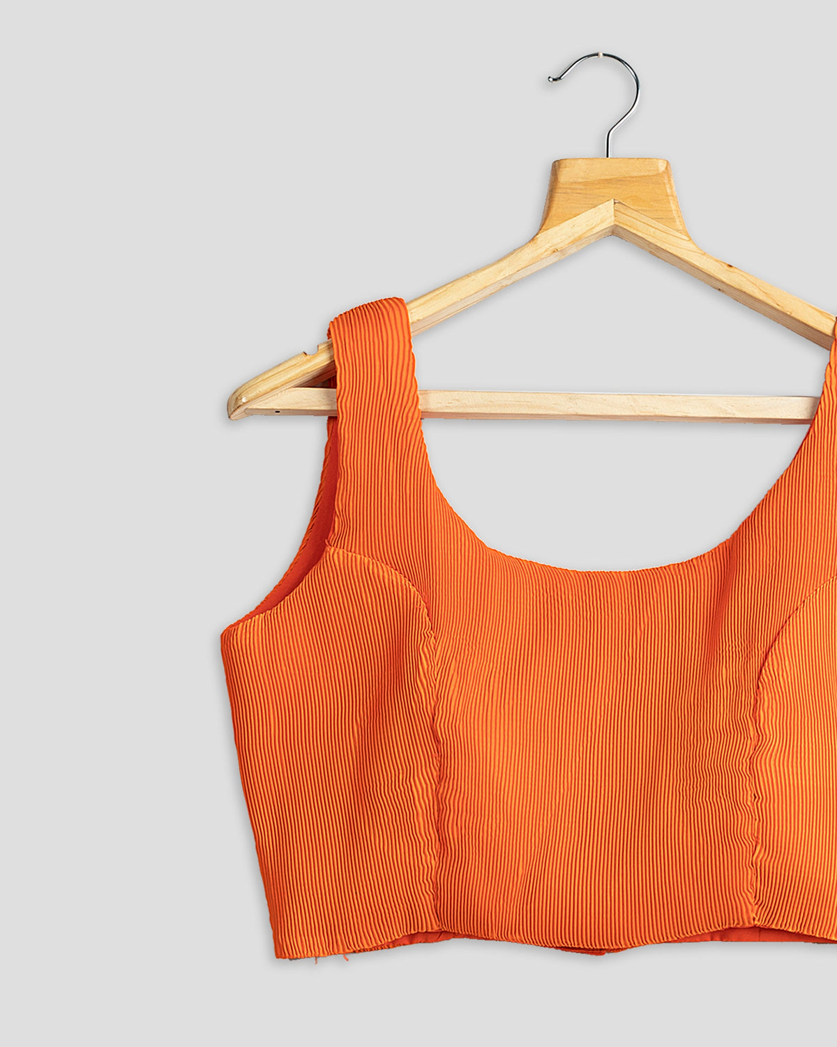 Blusa plisada naranja albaricoque