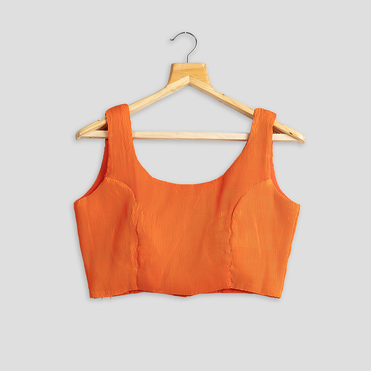 Blusa plisada naranja albaricoque