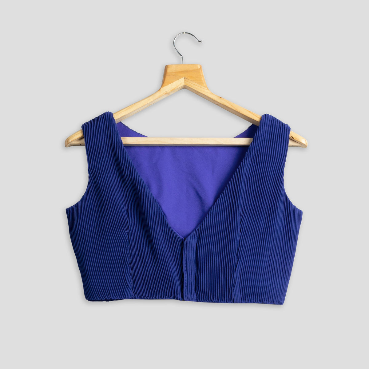 Blusa plisada azul real
