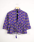 Chaqueta Patola morada y roja con cuello y volante