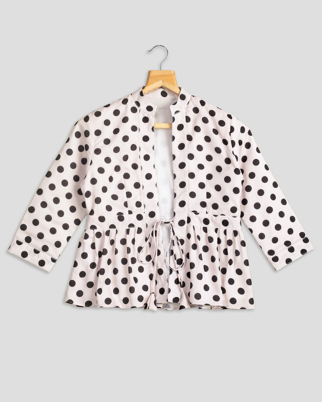 Chaqueta de mujer rosa de lunares con volante