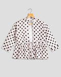 Chaqueta de mujer rosa de lunares con volante