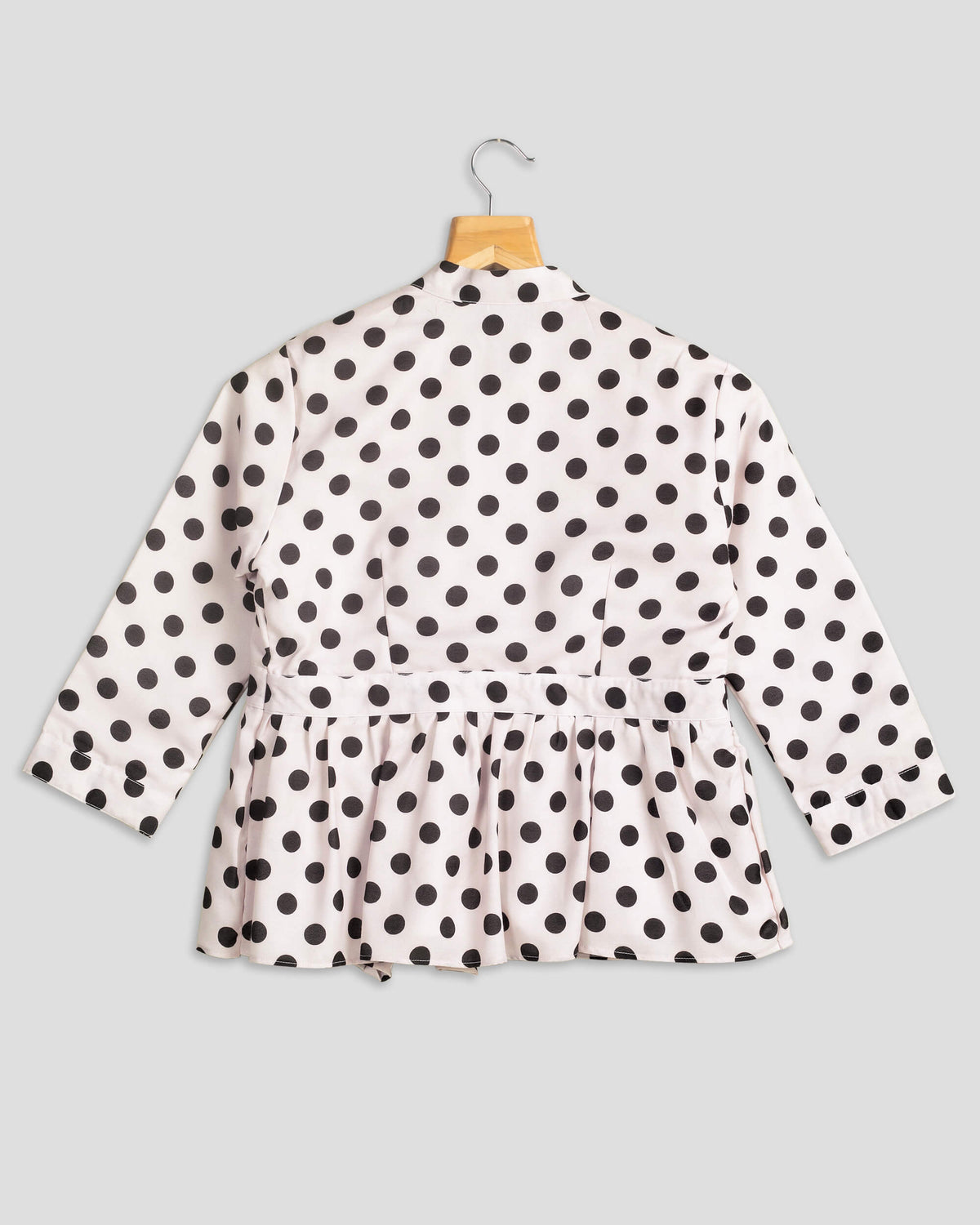 Chaqueta de mujer rosa de lunares con volante