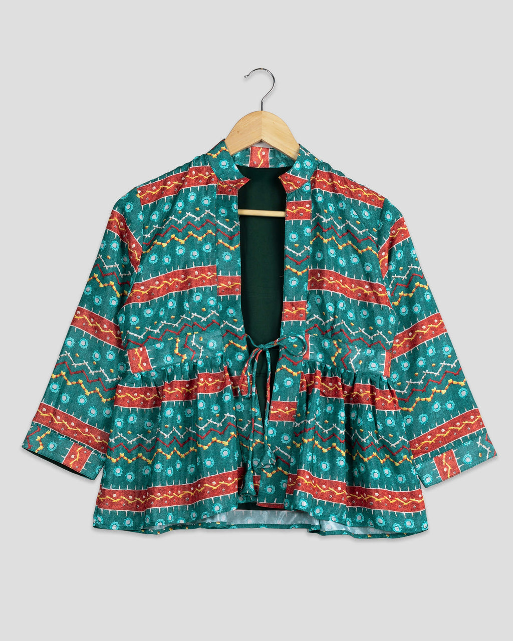 Chaqueta de mujer de satén verde pino