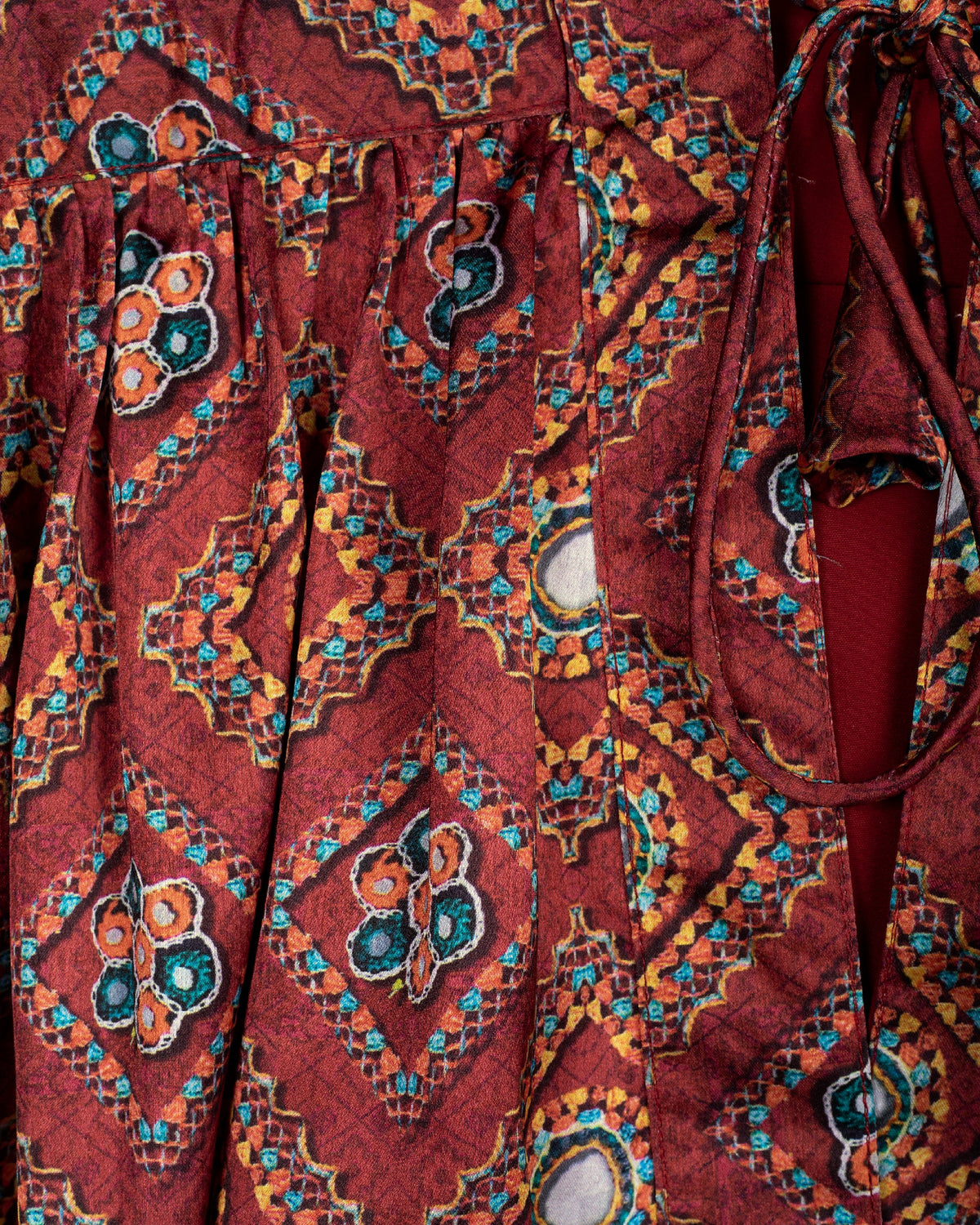 Chaqueta de mujer granate con estampado Gamthi